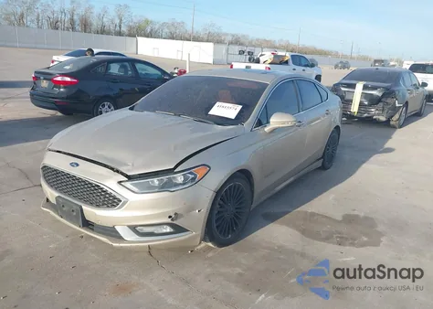 2017 Ford Fusion Hybrid Platinum z USA, uszkodzony, nr VIN 3FA6P0RU2HR416290